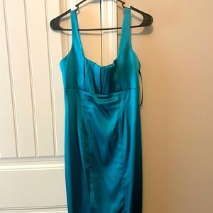 Calvin Klein turquoise dress.